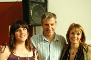 Volunteers Corrie and Kim getting some love from Farm Sanctuary's Gene Baur. This could be you!